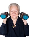 Happy old woman making fitness training with dumbbells Royalty Free Stock Photo