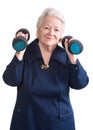 Happy old woman making fitness training with dumbbells Royalty Free Stock Photo