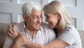 Happy older wife and husband hugging, looking in eyes Royalty Free Stock Photo