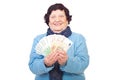 Happy older woman holding Euro banknotes Royalty Free Stock Photo