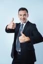 Happy optimistic man showing his optimism Royalty Free Stock Photo