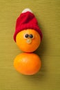 Happy orange in red hat