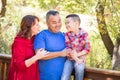 Mixed Race Caucasian and Hispanic Family on a Bridge