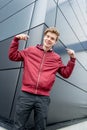 Happy and overly smiling teen boy gesticulating Royalty Free Stock Photo