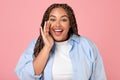 Oversized Black Lady Shouting Holding Hand Near Mouth, Pink Background