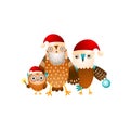 Happy owl family ready for Christmas holiday in santa hats