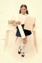 Happy about own project. Girl hold folder and whatman paper. Kid school uniform happy face ready with her project. Pupil