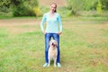 Happy owner woman with Golden Retriever dog walking together Royalty Free Stock Photo