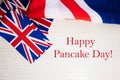 Happy Pancake Day. British holidays concept. Holiday in United Kingdom. Great Britain flag background Royalty Free Stock Photo