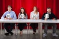 Panel Judges Holding 10 Score Signs