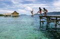 Happy Papua Kids Jumping to sea