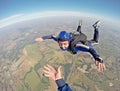 Happy parachutist smiling in freefall Royalty Free Stock Photo