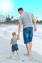 happy parent with a child by the sea in the open air Royalty Free Stock Photo