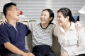 Happy parent and teenager,father mother and daughter have fun enjoy free time on weekend,asian family laughing playing together Royalty Free Stock Photo