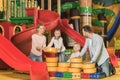 happy parents with adorable little kids playing together Royalty Free Stock Photo