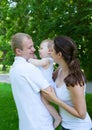 Happy parents with baby boy outdoors Royalty Free Stock Photo