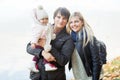 Happy parents with daughter walk in park Royalty Free Stock Photo