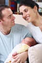 Happy parents holding their newborn baby Royalty Free Stock Photo