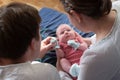 Happy parents holding their newborn baby girl Royalty Free Stock Photo