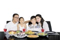 Happy parents hugging their children at lunch time Royalty Free Stock Photo