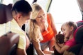 Happy parents with little girl in baby car seat Royalty Free Stock Photo