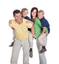 Happy parents piggybacking children