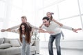 Happy parents play with children at home. Royalty Free Stock Photo