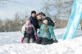 Happy parents and their kids in winterwear Royalty Free Stock Photo