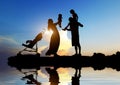 happy parents with their little children on the seacoast Royalty Free Stock Photo