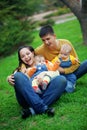 Happy parents with twins Royalty Free Stock Photo