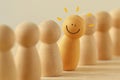 Happy pawn among a row of pawns - Think different and standing out from crowd concept