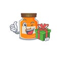 Happy peach jam character having a gift box