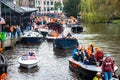 Happy people on boat at Koninginnedag 2013