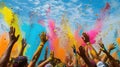 Happy people celebrating Holi festival, human hands throwing colorful powder on paint and sky background. Concept of color, party