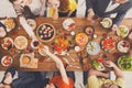 Happy people eat healthy meals at served table dinner party Royalty Free Stock Photo