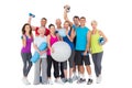 Happy people with exercise equipment