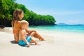 Young mother with happy son relax at tropical sea beach Royalty Free Stock Photo