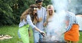 Happy people having camping and having bbq party Royalty Free Stock Photo