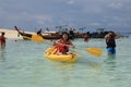 Happy People kayaking and snorkeling Royalty Free Stock Photo