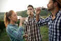 People tasting wine in vineyard Royalty Free Stock Photo