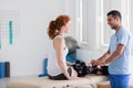 Happy personal trainer taking care of sportwoman Royalty Free Stock Photo