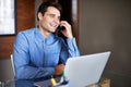 Happy, phone call and businessman with laptop in office for planning, networking or web communication. Smartphone Royalty Free Stock Photo