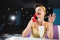 happy pin up woman talking on Royalty Free Stock Photo