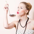 Happy pinup woman with ladle Royalty Free Stock Photo