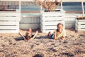 Happy playful children having fun together on summer beach carefree childhood lifestyle Royalty Free Stock Photo