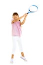 A little girl holds a tennis racket in her hands. Game, sports concept. Royalty Free Stock Photo