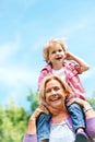 Happy, playful and piggyback with grandmother and grandson for bonding, fun and affectionate. Free time, weekend and