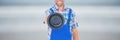 Happy plumber man holding a plunger Royalty Free Stock Photo