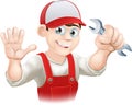 Happy plumber or mechanic with spanner Royalty Free Stock Photo
