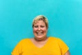 Happy plus size woman portrait - Curvy overweight model having fun smiling at camera Royalty Free Stock Photo